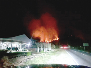 Struggle to put out Ranau forest fire